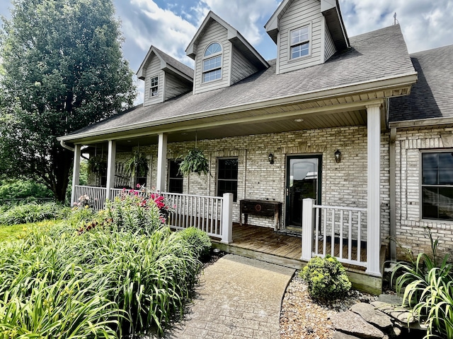 3745 Sweet Owen Rd, Owenton, KY 40359 - entrance to property featuring a porch, brick siding, and roof with shingles