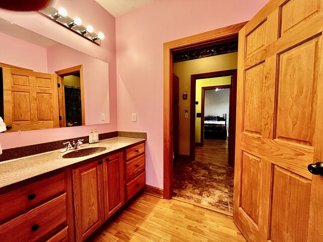 3745 Sweet Owen Rd, Owenton, KY 40359 - full bathroom featuring vanity, wood finished floors, and baseboards