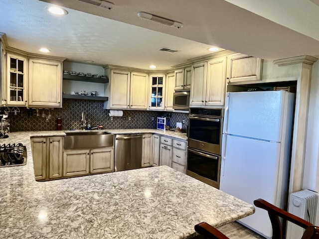 3745 Sweet Owen Rd, Owenton, KY 40359 - kitchen featuring stainless steel appliances, a sink, radiator heating unit, a peninsula, and recessed lighting