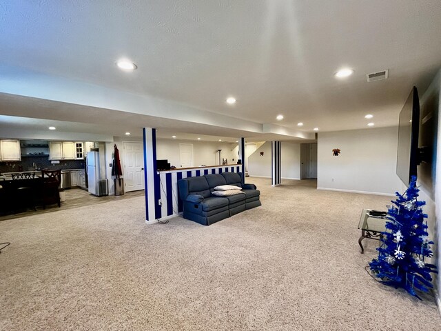 3745 Sweet Owen Rd, Owenton, KY 40359 - finished basement featuring freestanding refrigerator, recessed lighting, light colored carpet, bar area, and baseboards