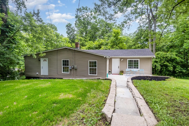 12077 Vises Trl, Covington, KY 41015 - view of front of property featuring a front lawn and a chimney