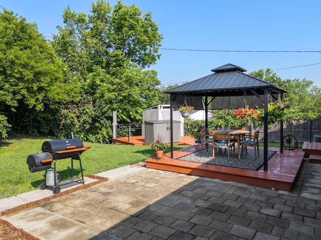 3771 Feather Ln, Elsmere, KY 41018 - view of patio with a shed, a gazebo, a wooden deck, and outdoor dining space