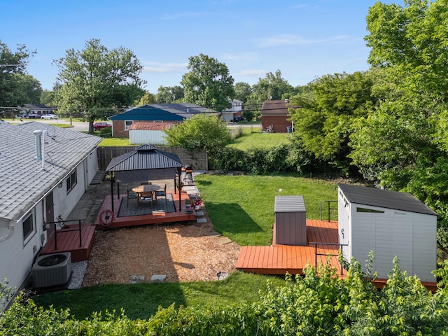 3771 Feather Ln, Elsmere, KY 41018 - fenced backyard featuring a gazebo, a storage unit, and a wooden deck