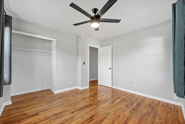 3771 Feather Ln, Elsmere, KY 41018 - unfurnished bedroom featuring hardwood / wood-style flooring, a closet, and a ceiling fan
