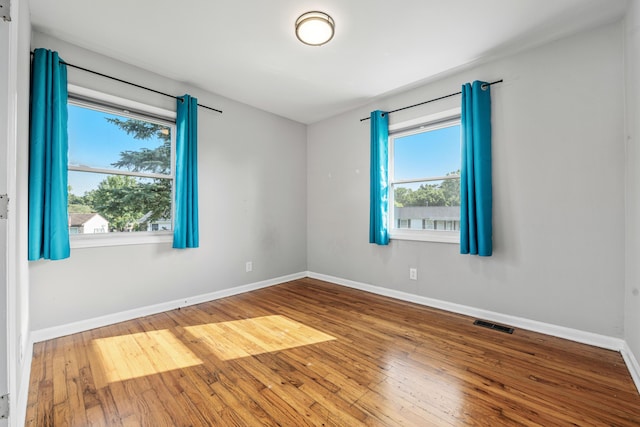 3771 Feather Ln, Elsmere, KY 41018 - unfurnished room with hardwood / wood-style flooring and plenty of natural light
