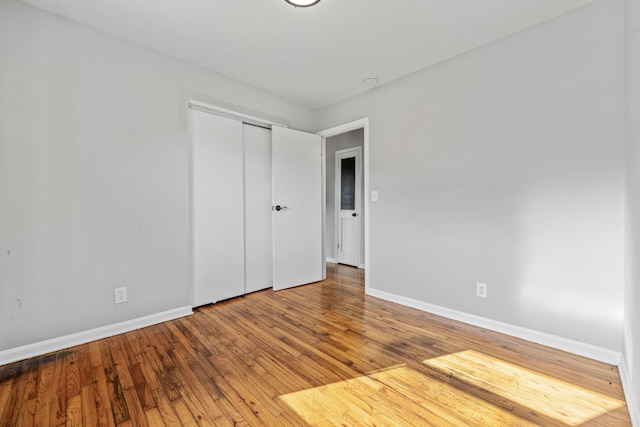 3771 Feather Ln, Elsmere, KY 41018 - unfurnished bedroom featuring wood-type flooring and a closet