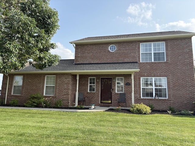 301 Fairway Dr, Dry Ridge, KY 41035 - view of front of house featuring a front lawn and brick siding
