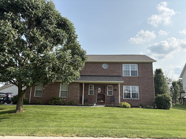 301 Fairway Dr, Dry Ridge, KY 41035 - view of front facade featuring a front yard and brick siding