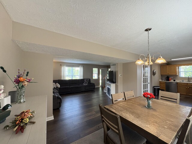 301 Fairway Dr, Dry Ridge, KY 41035 - dining room featuring a textured ceiling, dark wood-style floors, and a chandelier