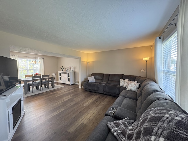 301 Fairway Dr, Dry Ridge, KY 41035 - living room featuring dark wood-style floors, a textured ceiling, and a chandelier