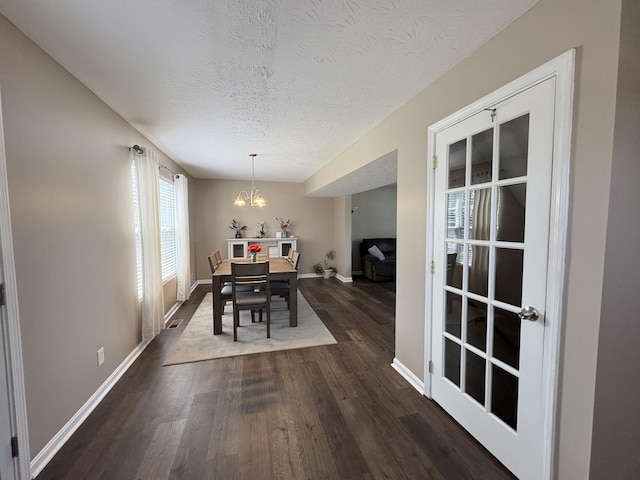 301 Fairway Dr, Dry Ridge, KY 41035 - dining room featuring a chandelier, dark wood finished floors, and a textured ceiling