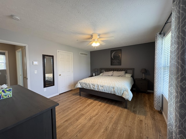 301 Fairway Dr, Dry Ridge, KY 41035 - bedroom featuring wood finished floors, a ceiling fan, and a textured ceiling