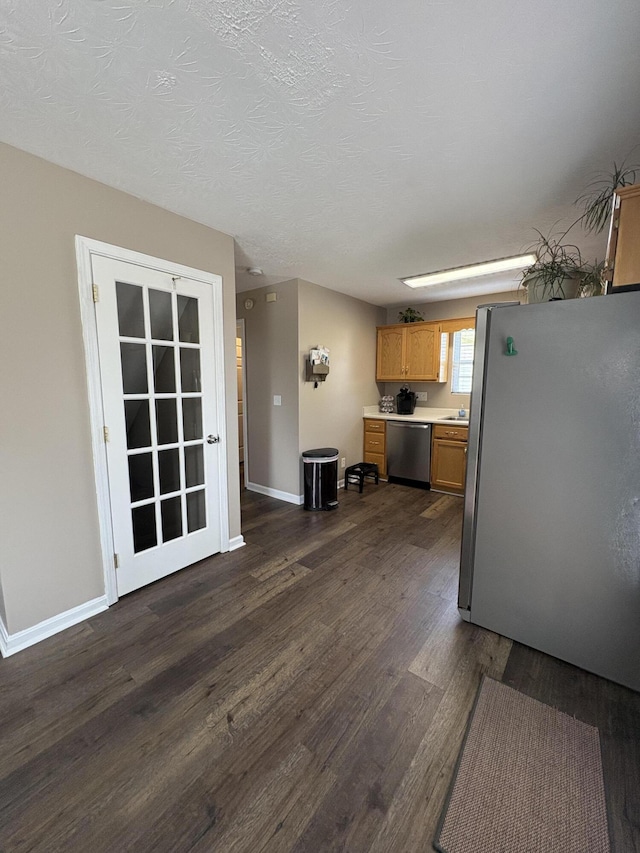 301 Fairway Dr, Dry Ridge, KY 41035 - kitchen with appliances with stainless steel finishes, dark wood-type flooring, light countertops, and a textured ceiling
