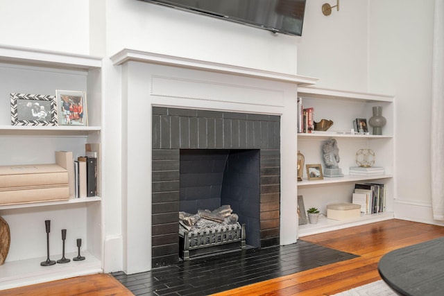 1915 Scott St, Covington, KY 41014 - detailed view of a fireplace and wood finished floors