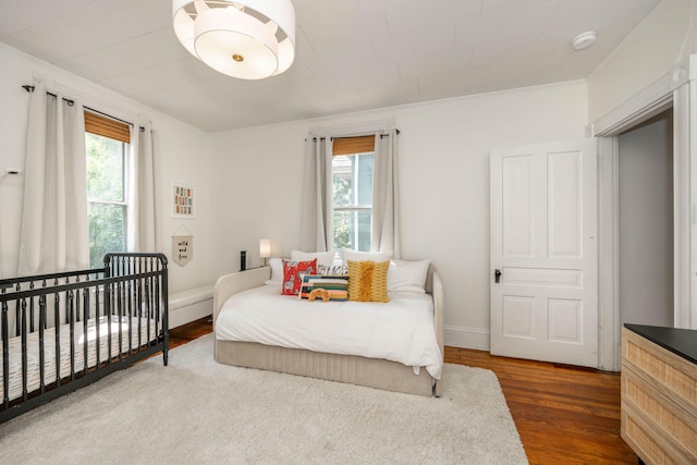 1915 Scott St, Covington, KY 41014 - bedroom with wood finished floors and ornamental molding