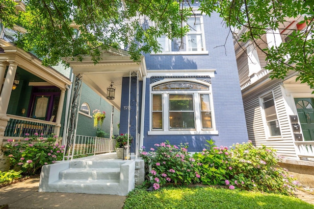 1915 Scott St, Covington, KY 41014 - entrance to property featuring brick siding and covered porch