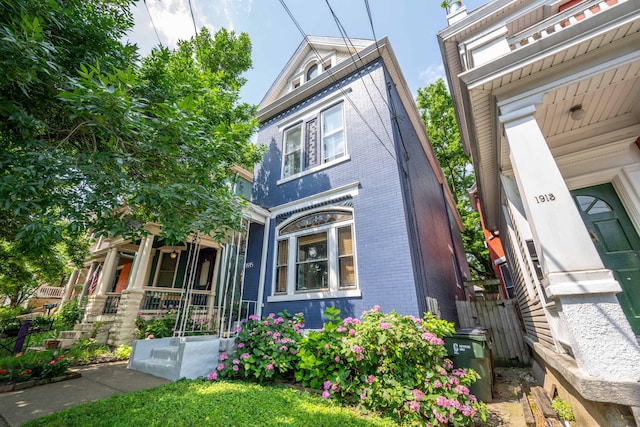 1915 Scott St, Covington, KY 41014 - view of front of property with brick siding and covered porch
