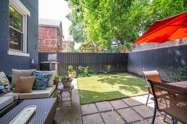 1915 Scott St, Covington, KY 41014 - fenced backyard with a patio