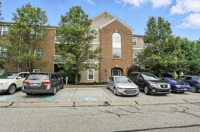 961 Mistflower Ln, Florence, KY 41042 - view of front of home with brick siding and uncovered parking