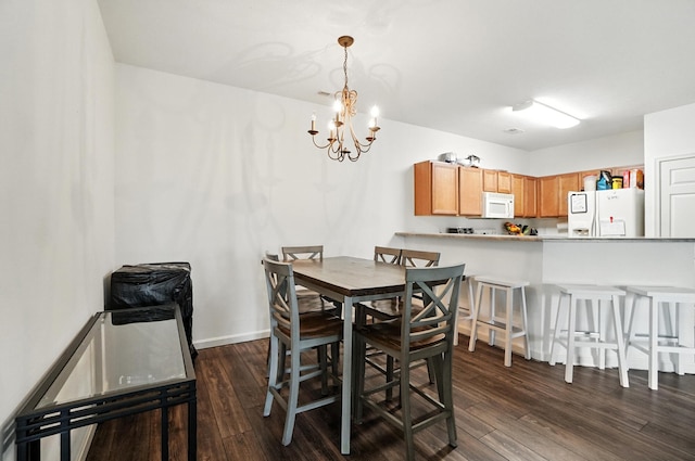 961 Mistflower Ln, Florence, KY 41042 - dining space with dark wood-type flooring and a chandelier