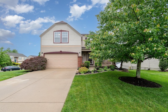 2246 Algiers St, Union, KY 41091 - view of front facade with an attached garage, driveway, and a front lawn