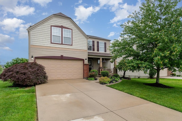 2246 Algiers St, Union, KY 41091 - view of front of property featuring a front lawn, a porch, a garage, and driveway