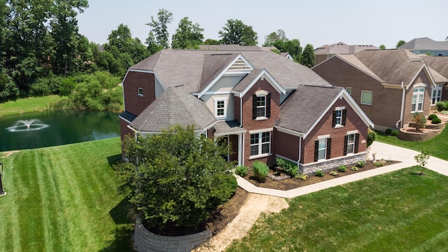 10608 Pegasus Ct, Union, KY 41091 - view of front facade featuring a water view, brick siding, a front lawn, and a shingled roof