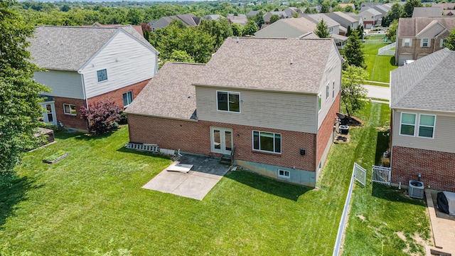 2282 Berkshire Ct, Florence, KY 41042 - back of house with a patio area, brick siding, a residential view, and roof with shingles
