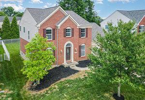 2282 Berkshire Ct, Florence, KY 41042 - colonial-style house featuring brick siding