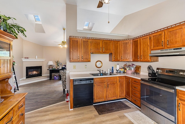 9171 Tamarack Dr, Covington, KY 41017 - kitchen featuring stainless steel range with electric stovetop, dishwasher, under cabinet range hood, a skylight, and a ceiling fan