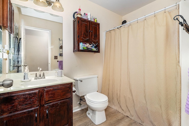 9171 Tamarack Dr, Covington, KY 41017 - full bathroom featuring vanity, wood finished floors, and a shower with curtain