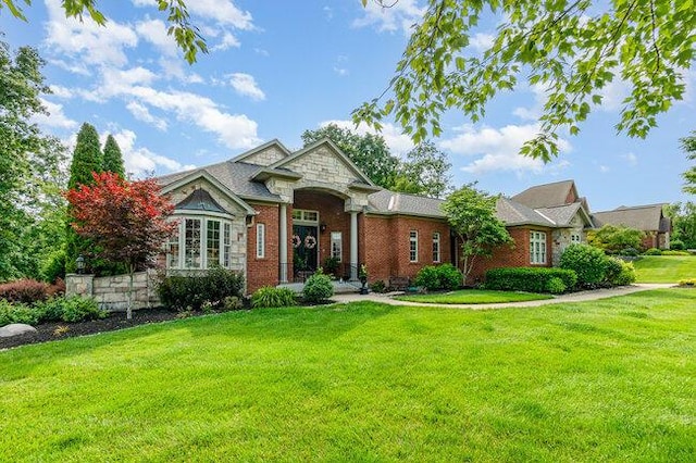 1217 Citation Dr, Union, KY 41091 - view of front facade with a front yard and brick siding