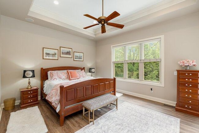 1217 Citation Dr, Union, KY 41091 - bedroom featuring a raised ceiling, wood finished floors, crown molding, and ceiling fan