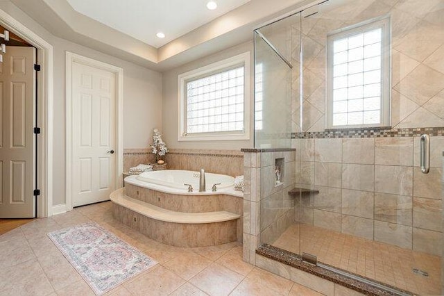 1217 Citation Dr, Union, KY 41091 - full bath featuring plenty of natural light, a garden tub, a stall shower, tile patterned floors, and recessed lighting