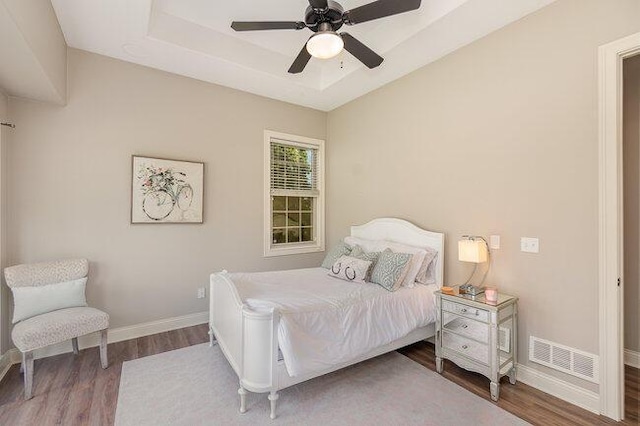 1217 Citation Dr, Union, KY 41091 - bedroom with wood finished floors, a ceiling fan, and a raised ceiling