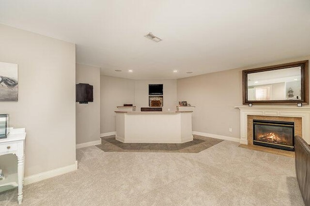 1217 Citation Dr, Union, KY 41091 - unfurnished living room with light carpet, a fireplace with flush hearth, and recessed lighting