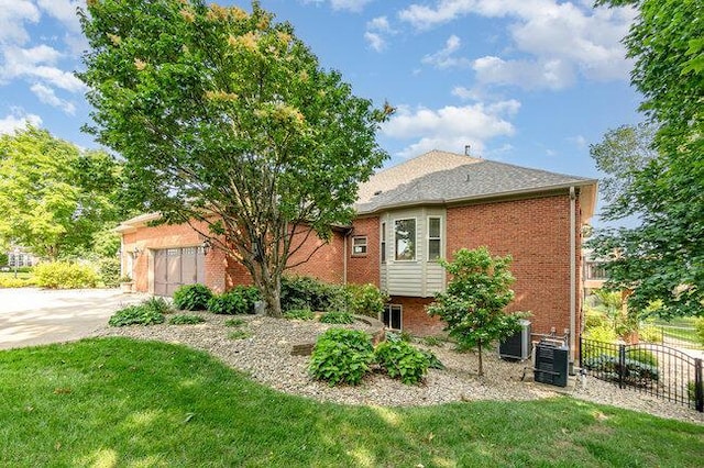 1217 Citation Dr, Union, KY 41091 - view of front of property featuring brick siding, driveway, and a garage