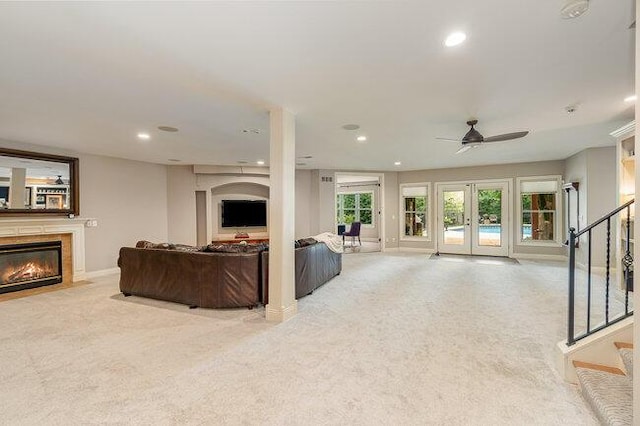 1217 Citation Dr, Union, KY 41091 - living area with a fireplace with flush hearth, light colored carpet, recessed lighting, stairway, and a ceiling fan