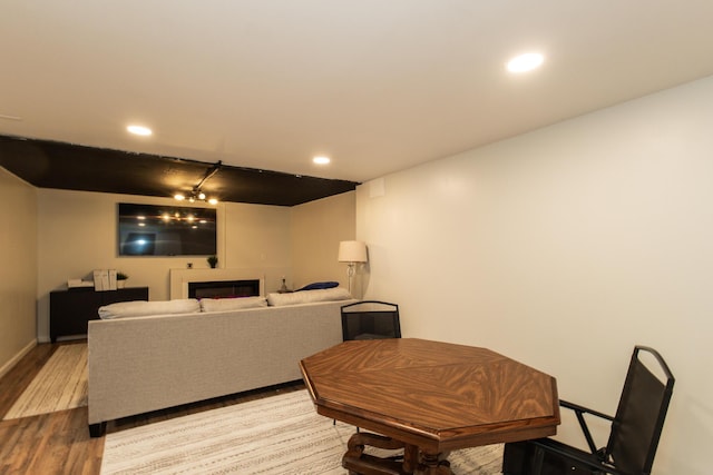 3141 Riggs Ave, Erlanger, KY 41018 - living area with wood finished floors, a fireplace, and recessed lighting