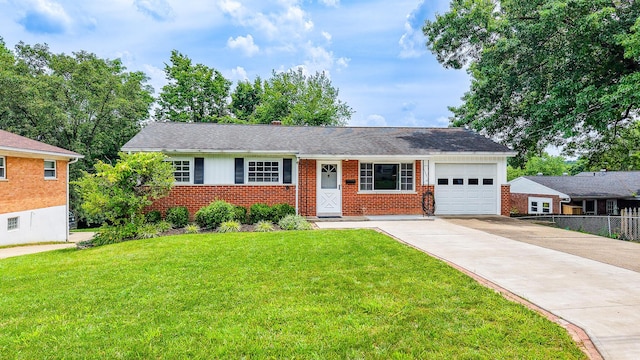 3141 Riggs Ave, Erlanger, KY 41018 - ranch-style home featuring an attached garage, brick siding, and concrete driveway