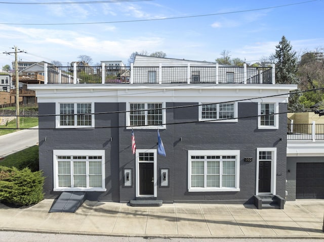 202 W 13th St, Newport, KY 41071 - view of front of house featuring entry steps, a balcony, and brick siding