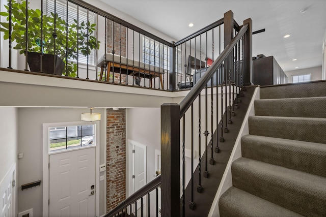 202 W 13th St, Newport, KY 41071 - stairway featuring a towering ceiling and recessed lighting