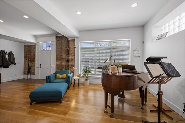 202 W 13th St, Newport, KY 41071 - living area with wood finished floors and recessed lighting
