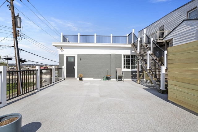 202 W 13th St, Newport, KY 41071 - exterior space with stairway and brick siding