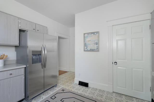 22 Woodland Pl, Fort Thomas, KY 41075 - kitchen featuring stainless steel fridge with ice dispenser and light countertops
