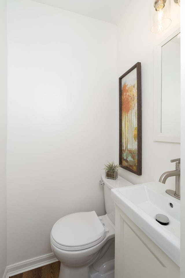 22 Woodland Pl, Fort Thomas, KY 41075 - half bath featuring vanity and wood finished floors