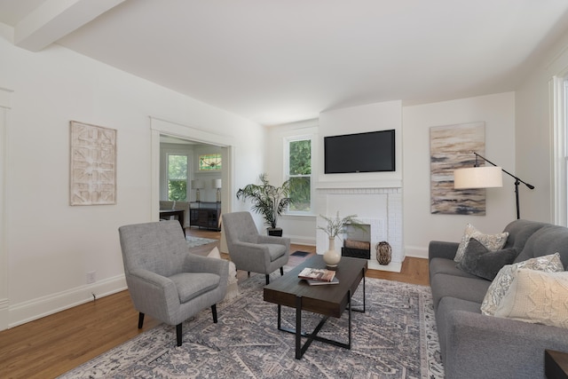 22 Woodland Pl, Fort Thomas, KY 41075 - living area featuring a brick fireplace and wood finished floors