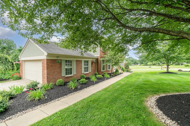8202 Heatherwood Dr, Florence, KY 41042 - view of side of property with brick siding, a garage, a yard, driveway, and a shingled roof