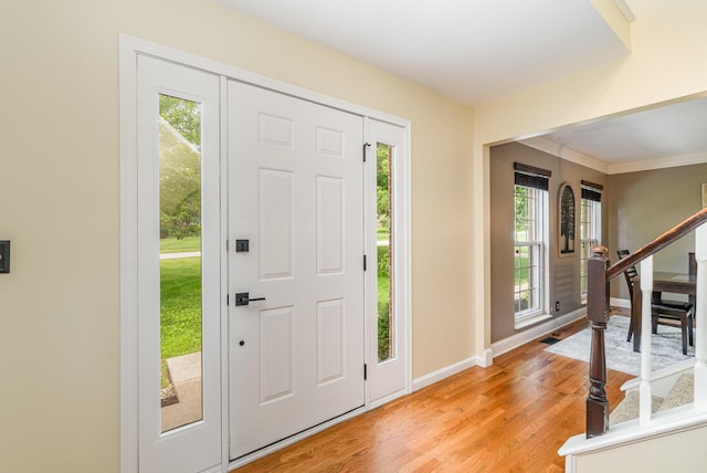 8202 Heatherwood Dr, Florence, KY 41042 - entrance foyer featuring plenty of natural light, light wood-style floors, and stairway