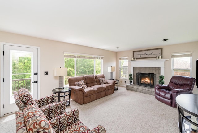 8202 Heatherwood Dr, Florence, KY 41042 - living room featuring carpet, healthy amount of natural light, and a brick fireplace